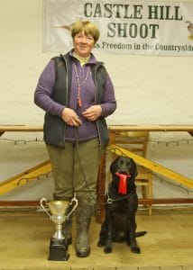 A very happy Heather Bradley who won the stake with her 5 year old labrador dog Chancelend Pitch of Heathergaye and made him up to a Field Trial Champion.